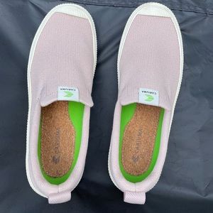 Trending Cariuma rose colored knit slip-on sneakers!